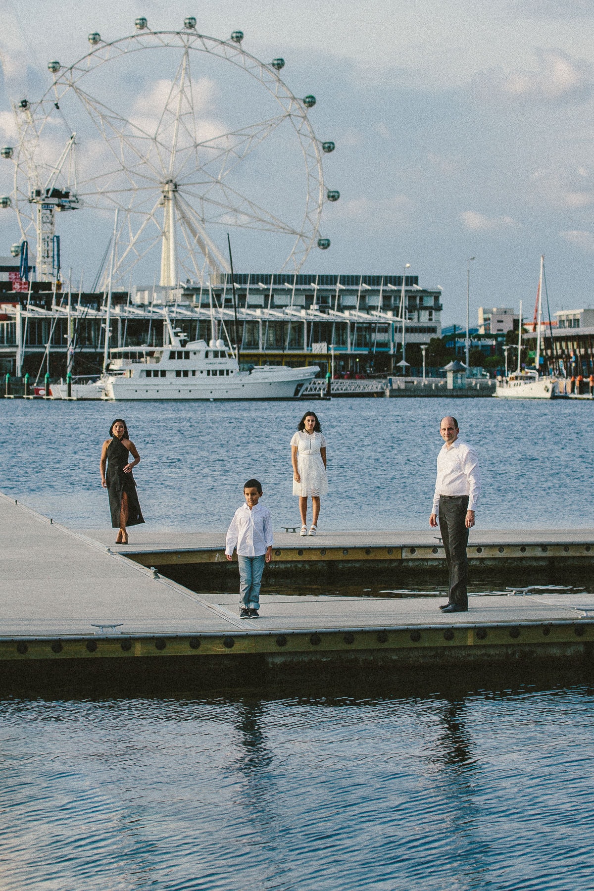 creative melbourne family photo in the docklands blue and white colours