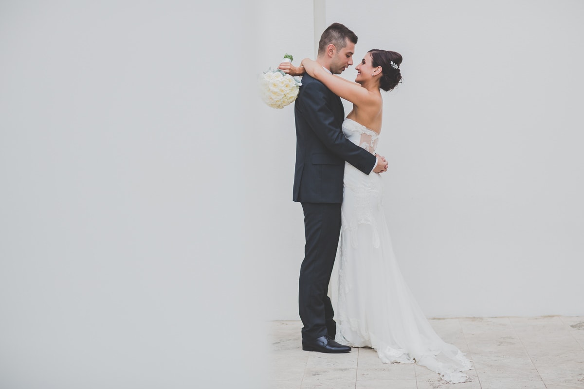 happy couple - white background - plain and simple wedding photo